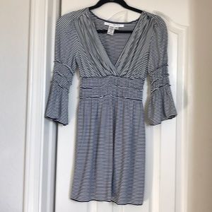 Max studio, long blouse or mini dress.